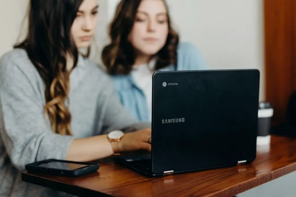Two females using a Samsung Chromebook